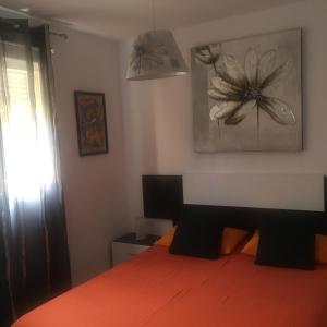 A bed or beds in a room at LasVistasApartment