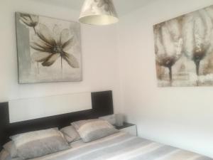 A bed or beds in a room at LasVistasApartment
