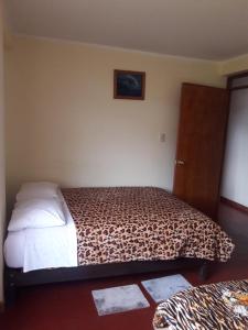 Cama o camas de una habitación en Suzet House