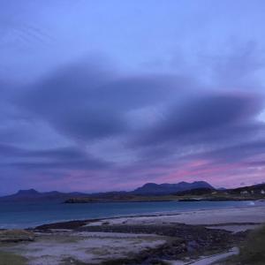 a cloudy sky over a body of water at The Sheiling in Laide +6 photos