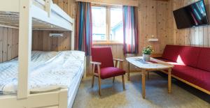 Кровать или кровати в номере Torpomoen