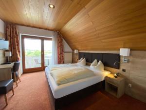 Cama o camas de una habitación en Hotel Herbstein
