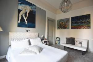 A bed or beds in a room at A Casa dell'Artista ViKi