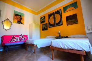 A bed or beds in a room at A Casa dell'Artista ViKi