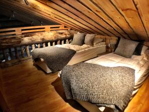 Кровать или кровати в номере Ruka Chalet Plage Oliver