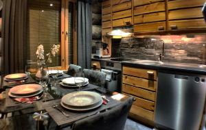 Кухня или мини-кухня в Ruka Chalet Plage Oliver
