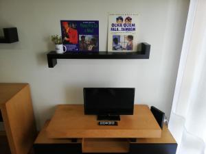 TV a/nebo společenská místnost v ubytování André´s São João Porto Apt. + 3 fotografie
