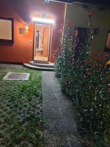 an entrance to a building with plants in front of it at Terme Čatež Apartma Nine in Čatež ob Savi