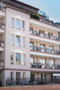 an image of a building with balconies at Kapana Luxury City Center Apartments with Garage in Plovdiv