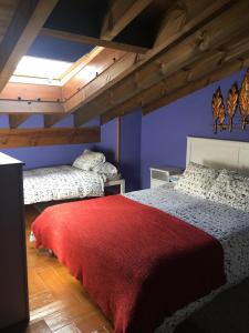 Ένα ή περισσότερα κρεβάτια σε δωμάτιο στο CASA RURAL ANTONIO