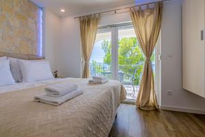 Postel nebo postele na pokoji v ubytování Palace Paulina Residence + 37 fotografií