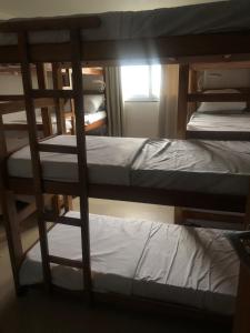 Postel nebo postele na pokoji v ubytování Laguna Hostel