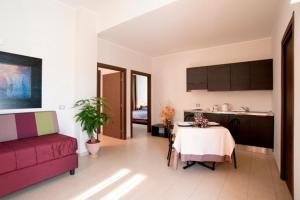 Kuchyň nebo kuchyňský kout v ubytování Hotel Massimino