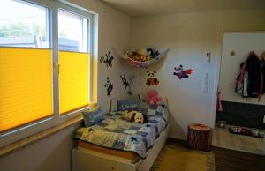 Postel nebo postele na pokoji v ubytování Schwimmendes Haus Robby II