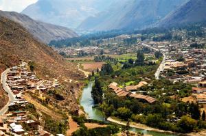 an aerial view of a village next to a river at Hotel Andes Urubamba by Ämak in Urubamba