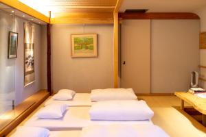 Luxury Condo Shikine An Gion Shirakawaにあるベッド