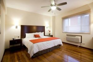 Кровать или кровати в номере Hotel Plaza Chihuahua