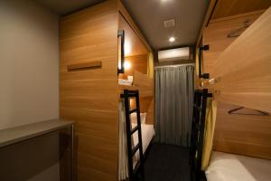 Postel nebo postele na pokoji v ubytování Grids Tokyo Ueno Hotel&Hostel