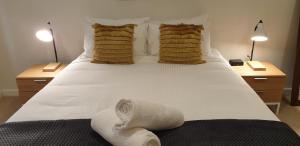 Cama o camas de una habitación en Pier Point 101