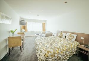 Postel nebo postele na pokoji v ubytování Airport Delta Motel