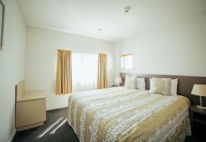 Postel nebo postele na pokoji v ubytování Airport Delta Motel