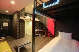 Postel nebo postele na pokoji v ubytování Place‧X Hotel