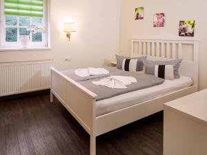 Postel nebo postele na pokoji v ubytování REGIOHOTEL Am Brocken Schierke