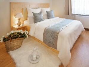Postel nebo postele na pokoji v ubytování REGIOHOTEL Germania am Kurpark Bad Harzburg