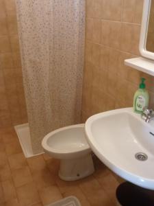Koupelna v ubytování Hotel Milano