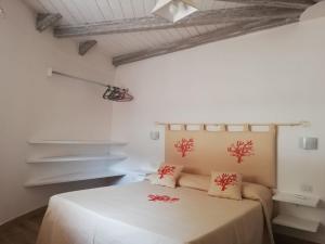 Ένα ή περισσότερα κρεβάτια σε δωμάτιο στο Agriturismo Dolceluna Le Capanne