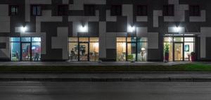 a building at night with lights on at Amarant Apart Hotel by CHM in Kyiv