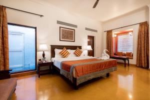 Fort JadhavGADH -A GADH Heritage Hotel客房内的一张或多张床位