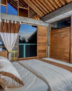 Postel nebo postele na pokoji v ubytování Lorong Homestay