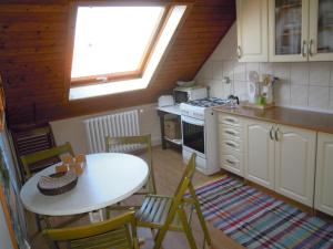 Kuchyň nebo kuchyňský kout v ubytování Apartmany Neuwald