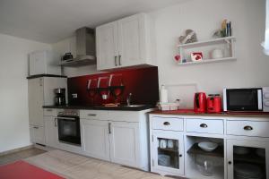 Kuchyň nebo kuchyňský kout v ubytování Ferienwohnung Memmel