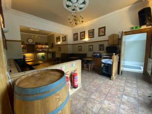 a large room with a barrel in the middle at Auld Mill House Hotel in Dunfermline
