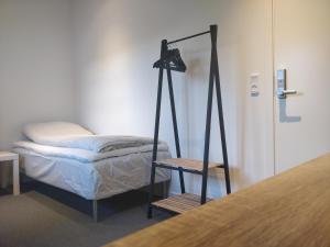 מיטה או מיטות בחדר ב-B & B Gødstrup - cafe og restaurant Den Gamle Stald
