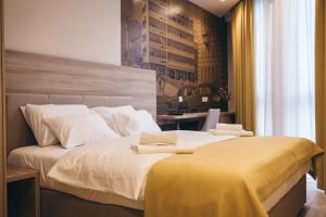 Krevet ili kreveti u jedinici u okviru objekta Hotel Verso