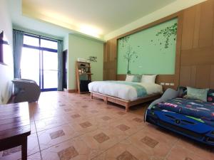 Giường trong phòng chung tại Love Ocean & Happy Bay HomeStay