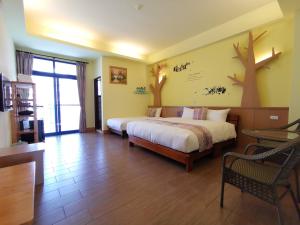 Giường trong phòng chung tại Love Ocean & Happy Bay HomeStay