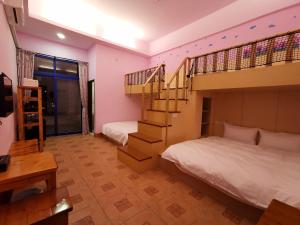 Giường trong phòng chung tại Love Ocean & Happy Bay HomeStay