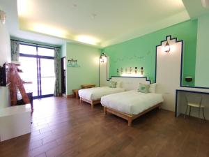 Giường trong phòng chung tại Love Ocean & Happy Bay HomeStay