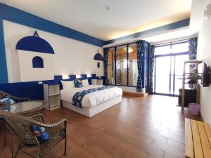 Giường trong phòng chung tại Love Ocean & Happy Bay HomeStay