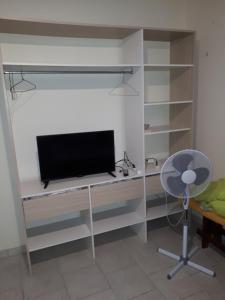 TV a/nebo společenská místnost v ubytování Refuge de Joel