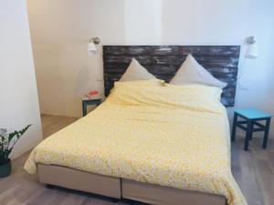 Postel nebo postele na pokoji v ubytování B&B MonteCengio