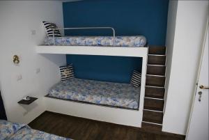 Postel nebo postele na pokoji v ubytování House SottoCoperta