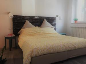 Postel nebo postele na pokoji v ubytování B&B MonteCengio
