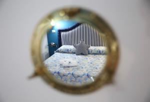 Postel nebo postele na pokoji v ubytování House SottoCoperta