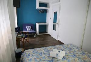 Postel nebo postele na pokoji v ubytování House SottoCoperta