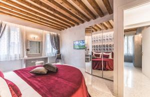 Ένα ή περισσότερα κρεβάτια σε δωμάτιο στο Rialto Luxury Flat